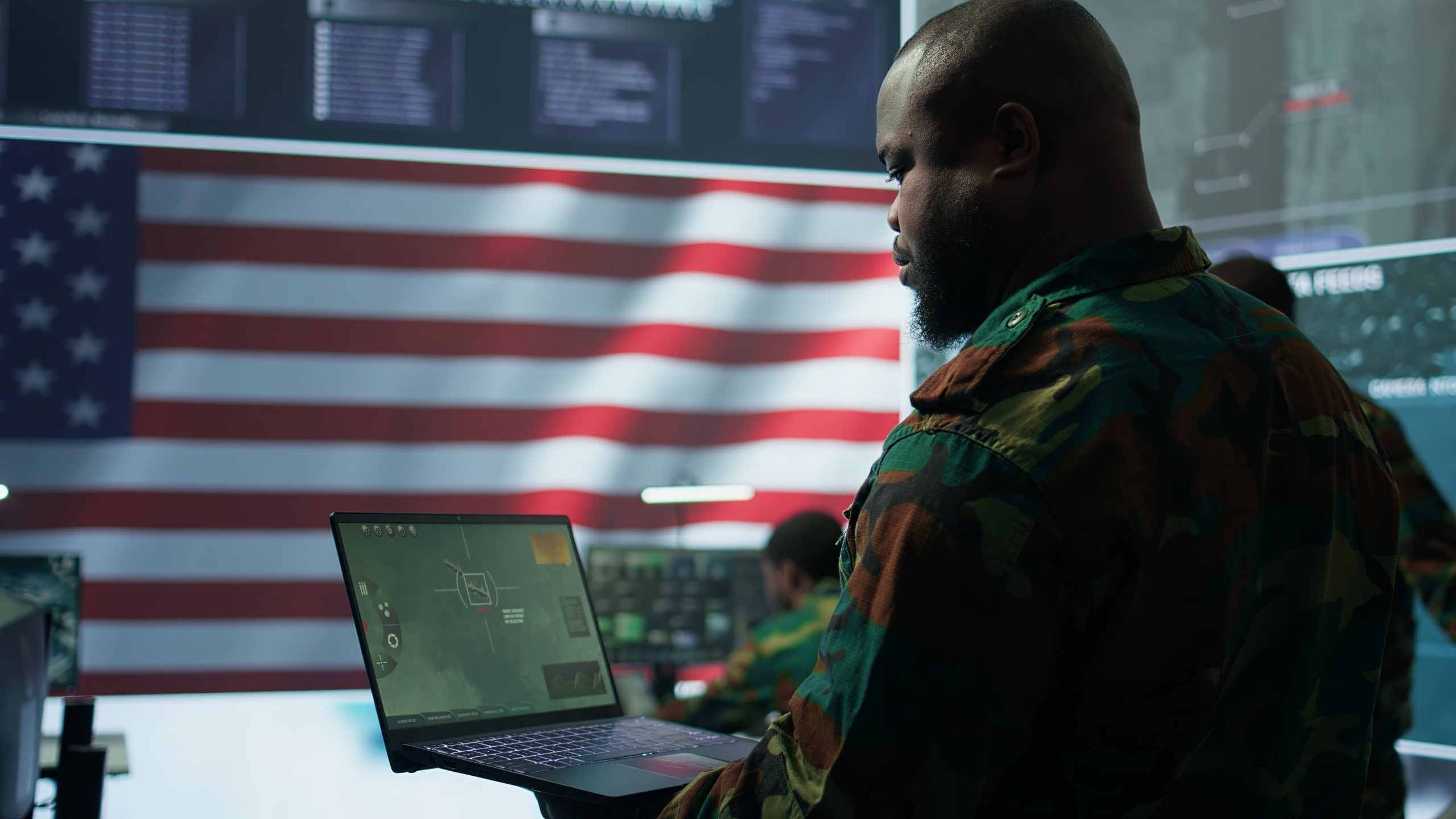 Intelligence officers in american military uniforms work in command post